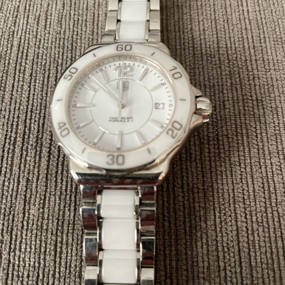 Woman’s, Tag Heuer, white quartz, watch.
